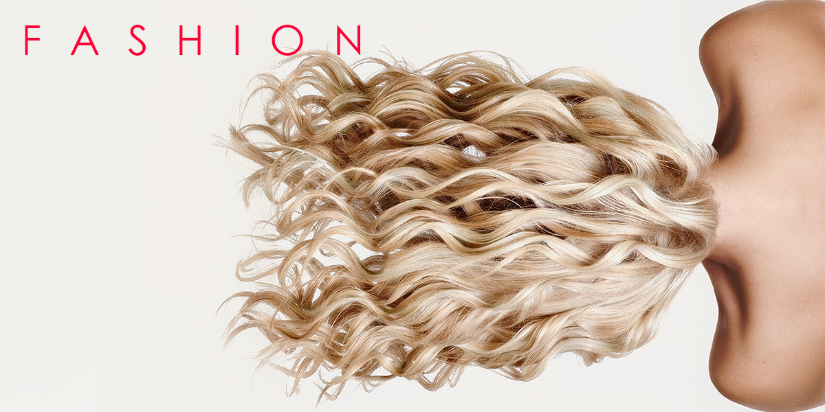 Womans Hair flows upside down for a Fashion Ad shot at Yungblut Photography Studio in Niagara for Hair Salon